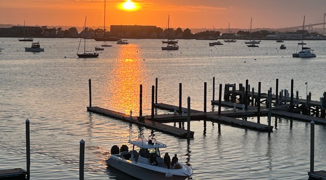 A Newport stroll, a bizarre meet and greet with genuflecting … and a harbor sunset.